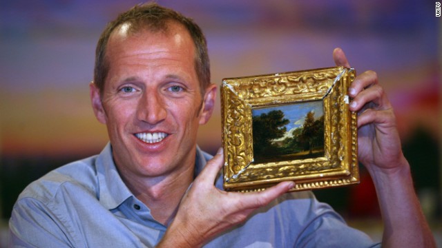 Robert Darvell with his Constable landscape -- thought to be worth $390,000.