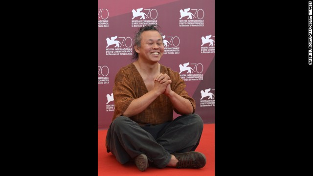 South Korean director Kim Ki-duk poses during a photo call for "Moebius," presented out of competition on September 3.