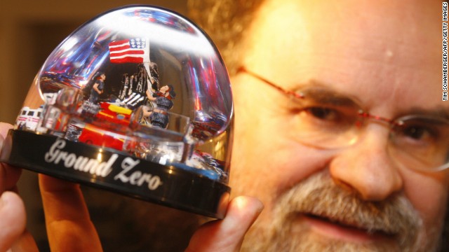 A snow globe owned by collector Josef Kardinal depicts the flag raising at ground zero. He is seen in 2006 at his home in Nuremberg, Germany.