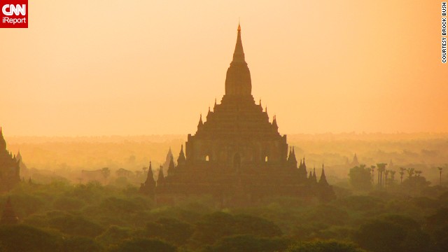 Buddhist temples peek through the <a href='http://ireport.cnn.com/docs/DOC-946879'>morning haze</a> in Bagan.