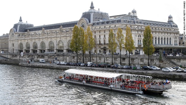 The Musee D'Orsay building is a former Paris train station that displays artwork from 1848 to 1914. It opened in 1986 with collections compiled from three French museums; the Louvre, Musée du Jeu de Paume and the National Museum of Modern Art.