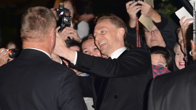 Actor Tom Hiddleston greets fans at the "Only Lovers Left Alive" premiere at the Ryerson Theatre on September 5.