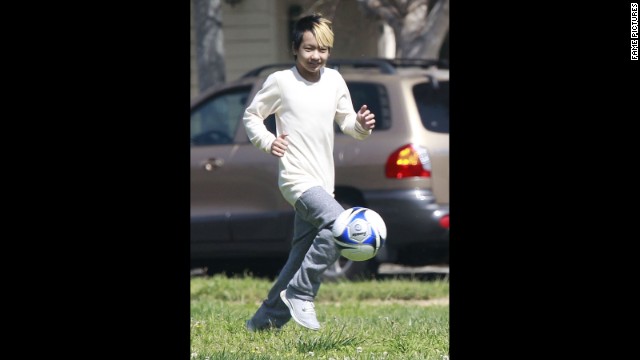 In March 2013, a soon-to-be 12-year-old Maddox played soccer with friends in a park. 