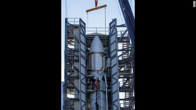 The moon orbiter sits in the nose-cone at the top of the Minotaur V rocket, a ballistic missile converted into a space launch vehicle.