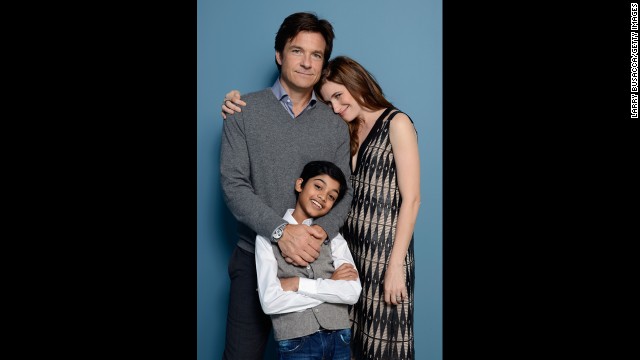 Actor/director Jason Bateman, actor Rohan Chand and actress Kathryn Hahn of "Bad Words" pose at the Guess Portrait Studio on September 6.