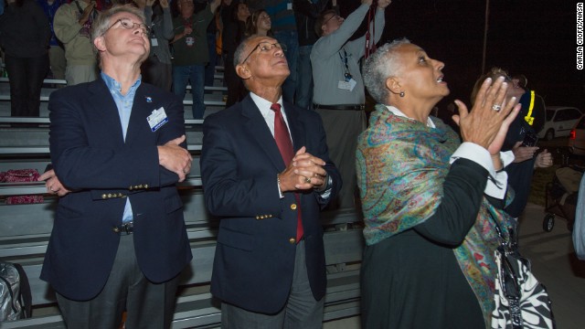 David W. Thompson, chairman and CEO of Orbital Sciences, left, NASA Administrator Charles Bolden and Mrs. Jaqueline Bolden watch the launch on September 6.