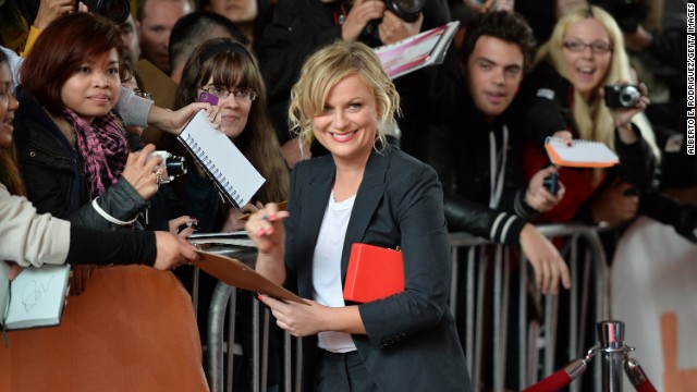 Actress Amy Poehler signs autographs at the "You Are Here" premiere at the film festival on Saturday, September 7.