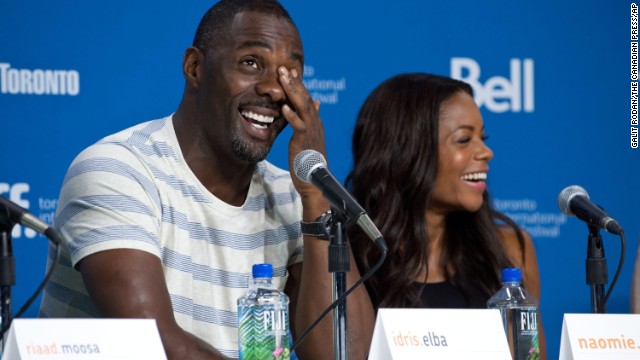 Actors Idris Elba and Naomie Harris appear at the press conference for "Mandela: Long Walk to Freedom" on September 8.