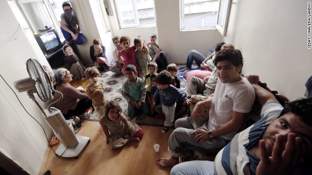 A Syrian refugee family of 26 people shares one room in the Eminonu district in Istanbul, Turkey, on September 9. The family fled Syria seven months ago.