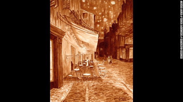 Using coffee and a watercolor paintbrush, artist Karen Eland created this version of van Gogh's "Cafe Terrace at Night."