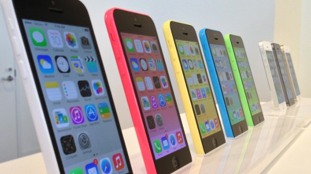 The latest additions to the iPhone line -- the colorful iPhone 5C, left, and higher-end iPhone 5S -- mark the first time Apple has launched two new versions of the phone. Initial reviews have been positive.