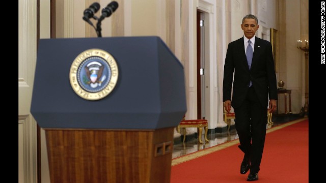 President Barack Obama approaches the podium in the East Room of the White House on Tuesday, September 10, for a speech addressing the nation on the justification for possible military action against the regime of Syrian President Bashar al-Assad. The regime is accused of launching a horrific chemical weapons attack in the suburbs of Damascus that killed more than 1,400 people.