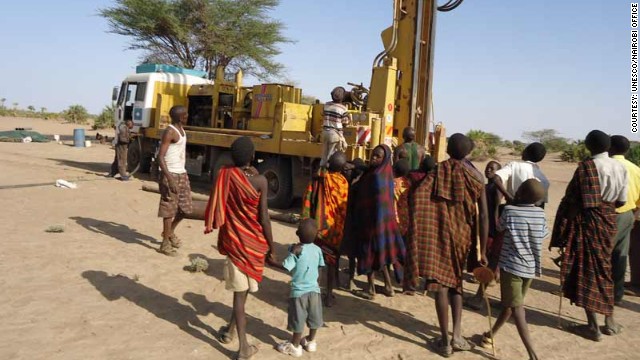 Community members gather at a selected drilling site at Nawaitarong village Kenya in a photo provided by UNESCO.