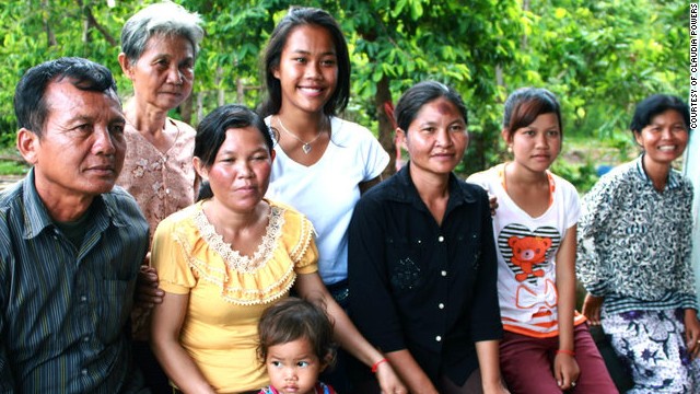 Powers with her Cambodian family. "The women are my mother's sisters."