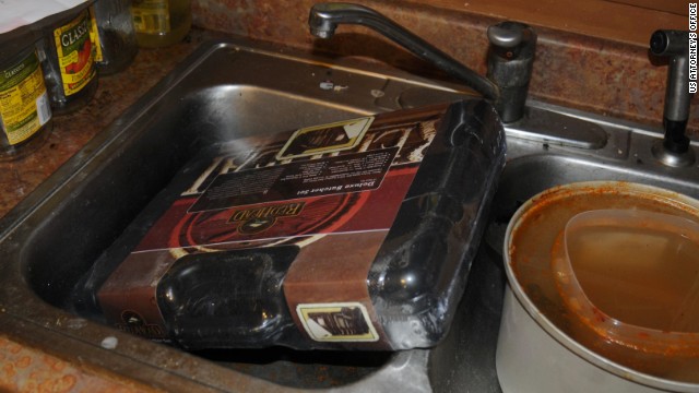 A deluxe butcher set is pictured in his sink. 