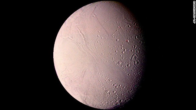 This image of Saturn's moon Enceladus shows impact craters up to 22 miles in diameter, as well as smooth uncratered areas. 