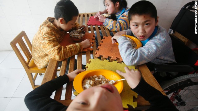 Children with cerebral palsy at a Chinese orphanage in 2009. Beijing now gives priority to adoption of disabled children by foreign families.