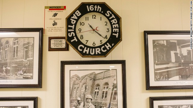 The clock that once hung in the church's sanctuary stopped at 10:22 a.m. when the bomb planted by Ku Klux Klansmen exploded 50 years ago. It is on display in the church basement, along with photographs illustrating the tensions of the era. 