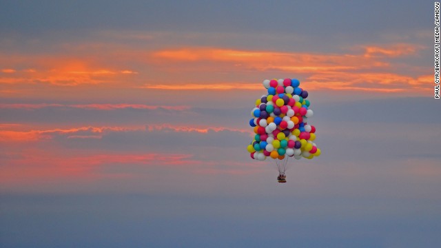 <a href='http://edition.cnn.com/2013/09/13/world/americas/atlantic-balloon-crossing-aborted/'>Jonathan Trappe</a>, a fearless adventurer, has taken to the skies in a bid to become the first man to successfully cross the Atlantic Ocean in a balloon cluster. Trappe took off from Caribou, Maine, on Thursday morning, September 12, to begin a 2,500 mile journey across the Atlantic Ocean. 