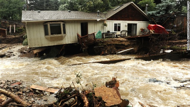 Floodwaters surround a home in Jamestown, Colorado, on Sunday, September 15.