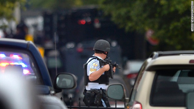 A U.S. Park Police officer stands guard near the scene of the shooting.
