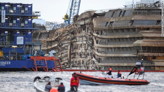 After an ambitious salvage attempt, the wrecked cruise ship the <a href='http://www.cnn.com/2013/09/15/world/europe/italy-costa-concordia-salvage/index.html?hpt=hp_c1'>Costa Concordia is now standing upright</a>, engineers announce early Tuesday, September 17.