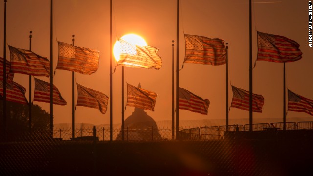 U.S. flags surrounding the Washington Monument fly at half-staff on September 17.