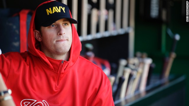 Washington Nationals relief pitcher Ian Krol wears a Navy hat in the dugout of Nationals Park in Washington before a game against the Atlanta Braves on September 17.
