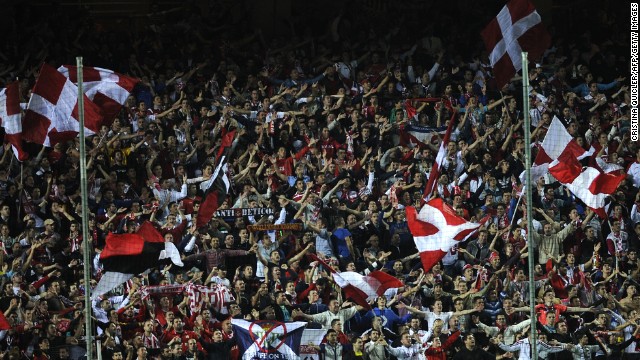 Spain is home to what many believe is the greatest club football team ever assembled -- FC Barcelona. But other teams also have their fans. Here Sevilla FC supporters cheer their team during a match against Real Betis in Seville in November.
