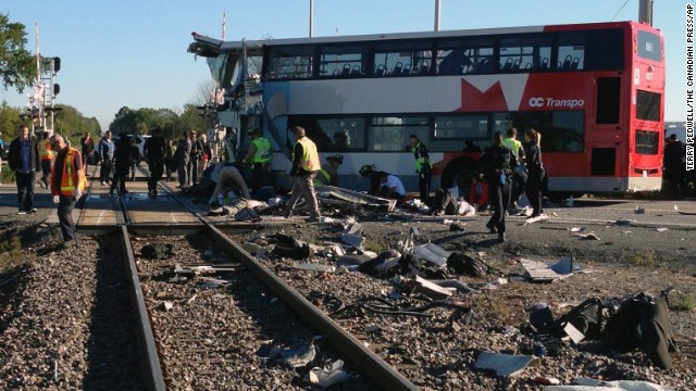 Officials respond to the scene in Ottawa on September 18.