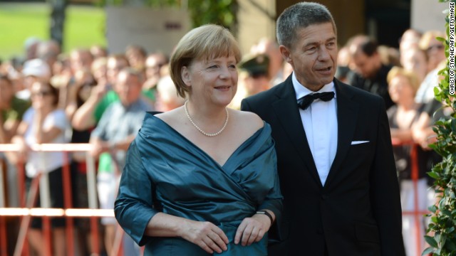 Merkel shares a passion for opera with her camera-shy husband, Joachim Sauer. Here they are pictured arriving for the opening of the Bayreuth Wagner Opera Festival in July 2012.