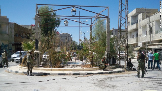 Rebels gather on a square in Damascus' Shebaa district on September 17.
