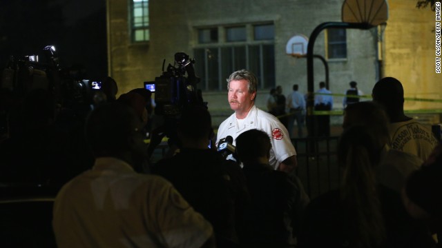 Deputy District Fire Chief James Mungovan updates the media after the shooting at Cornell Square Park on September 19.