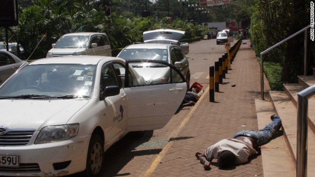 Bodies lie outside the shopping mall.