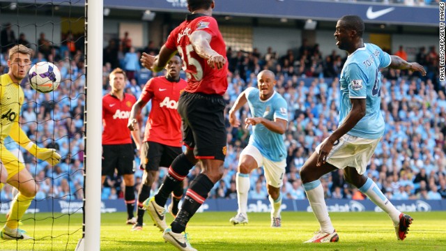 Yaya Toure (right) scored the crucial second goal in time added on to the first half, diverting Negredo's header into the net. 