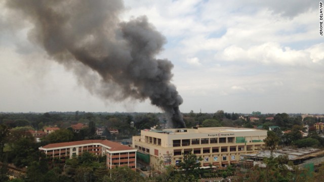 Heavy smoke rises from the Westgate Shopping Mall in Nairobi, Kenya, where hostages were being held for a third day on Monday, September 23. Gunmen burst into the mall and opened fire in a deadly attack on September 21. Terrorists from the Somalia-based Al-Shabaab group were believed to have about 10 remaining hostages on one level of the mall, security officials said. 