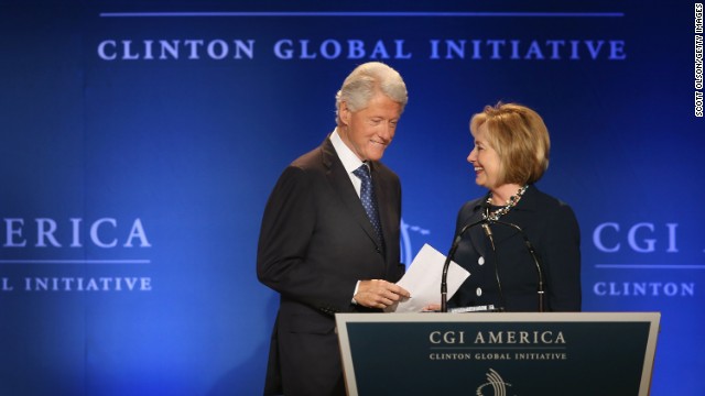 Bill Clinton and Hillary Clinton speak to guests at the Clinton Global Initiative on June 14 in Chicago.