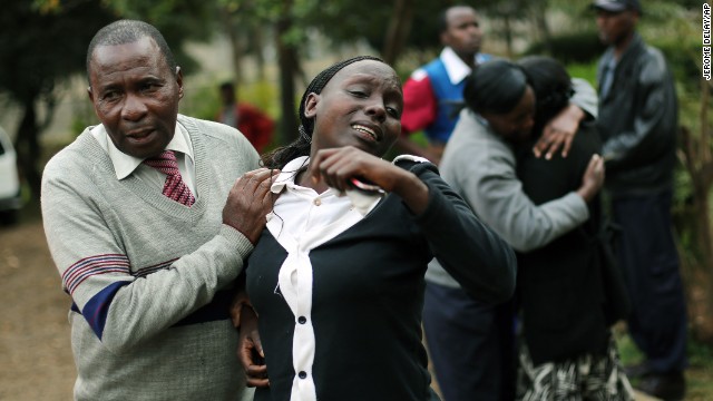 Relatives of Johnny Mutinda Musango, 48, weep after identifying his body at the city morgue in Nairobi, Kenya, on Tuesday, September 24. Musango was one of the victims of the Westgate Mall hostage siege. Kenyan security forces were still combing the mall on the fourth day of the siege by al Qaeda-linked terrorists.