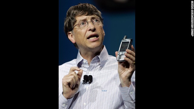 Gates holds a new Palm Treo 700w smartphone during a keynote address at the 2006 Consumer Electronics Show in Las Vegas.