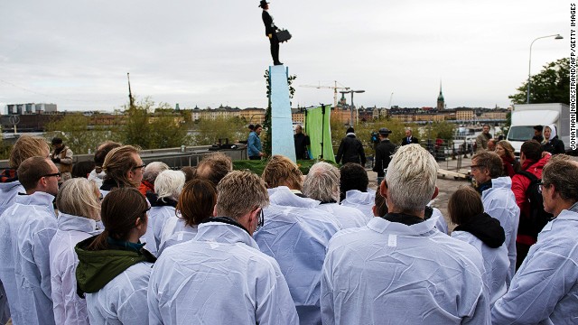 Activists gather outside the the United Nation's Intergovernmental Panel on Climate Change on September 27, 2013 in Stockholm.