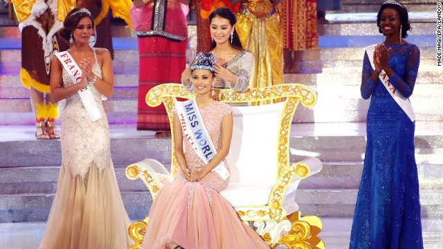 Miss World 2012, Yu Wenxia crowns Megan Young of the Philippines as the new Miss World during the grand finale of the Miss World 2013 beauty pageant held at Bali Nusa Dua in Bali, Indonesia, on Saturday, September 28. "No words! Thank you so much for everyone for choosing me," said Young. "I promise to be the best Miss World ever." Miss France Marine Lorphelin, left, took second and Miss Ghana Carranzar Naa Okailey Shooter, took third. 