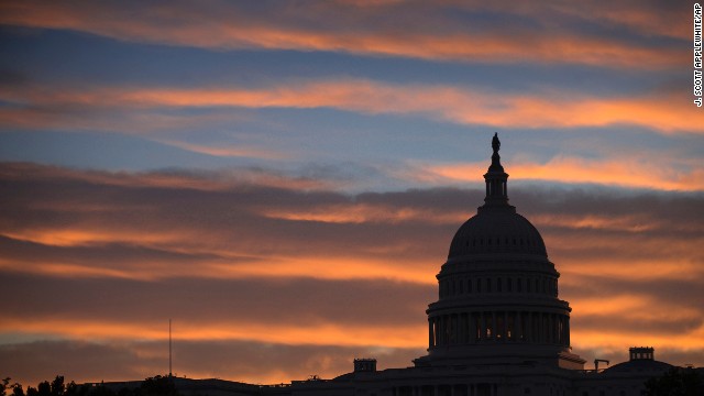 The U.S. Capitol in Washington is seen at dawn on Monday as the country faces a. possible government shutdown at midnight.