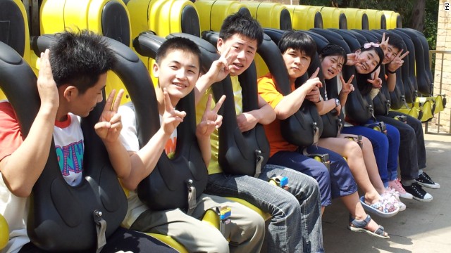 From feeding out of dustbins and frequent beatings, to the joy of an amusement park trip in China, the group was given hope of a better life.