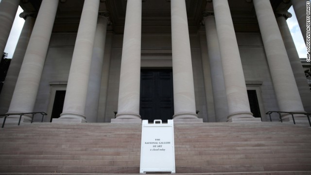 A sign alerting visitors that the National Gallery of Art is closed stands outside the building on October 1.