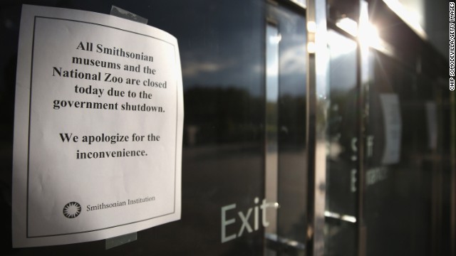 Signs taped on museum doors alert visitors that the National Museum of American History in Washington is closed on October 1.