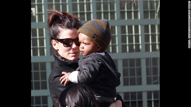 Bullock and her son, Louis, are spotted on the streets of Manhattan in 2011.
