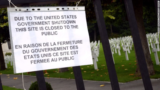 A sign informs visitors that the Suresnes American Cemetery and Memorial, west of Paris, is closed because of the shutdown on October 1.