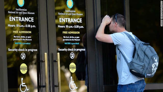 A man looks into the closed Smithsonian National Air and Space Museum in Washington on October 1.