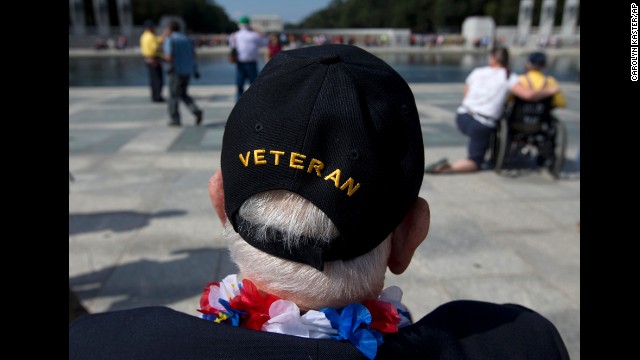 World War II Veteran George Bloss, from Gulfport, Mississippi, looks out over the National World War II Memorial in Washington, on October 1. Veterans who had traveled from across the country were allowed to visit the National World War II Memorial after it had been officially closed because of the partial government shutdown. 