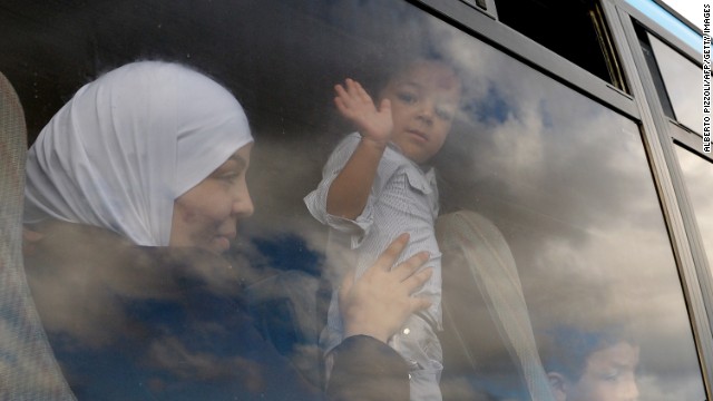 A child, part of a group of migrants, arrived in Lampedusa in October.